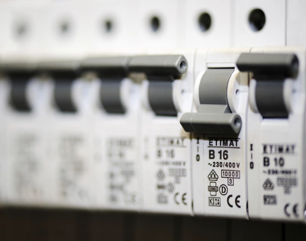 Close-up of circuit breakers in a clean panel